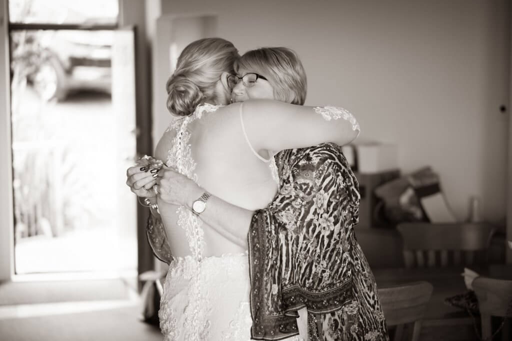 Real Bride Jamielle wearing her Custom Harriett Falvey Wedding Dress and Veil Made in New Zealand